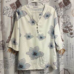 MISSLOOK White Blouse with Blue Floral Design. A purplish /bluish flower color